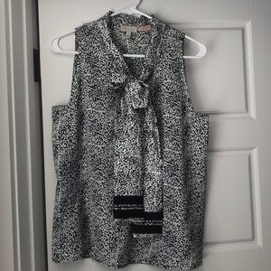 Black and white blouse with bow detail